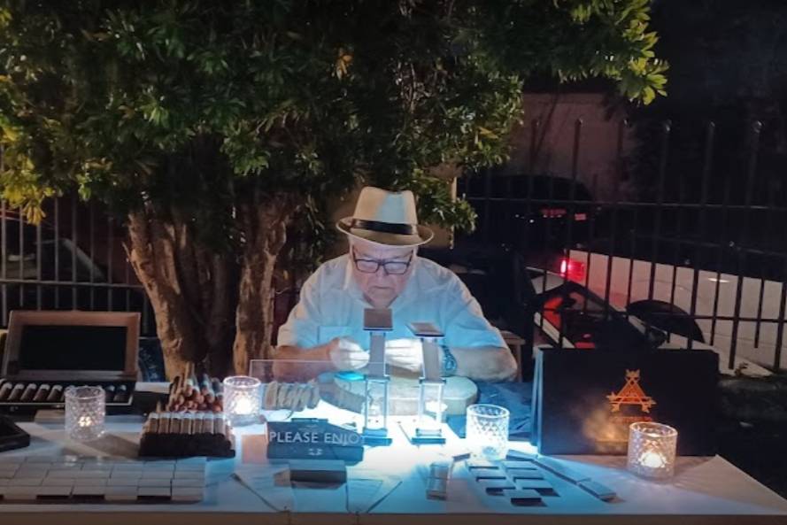 Rolling cigars for wedding guests