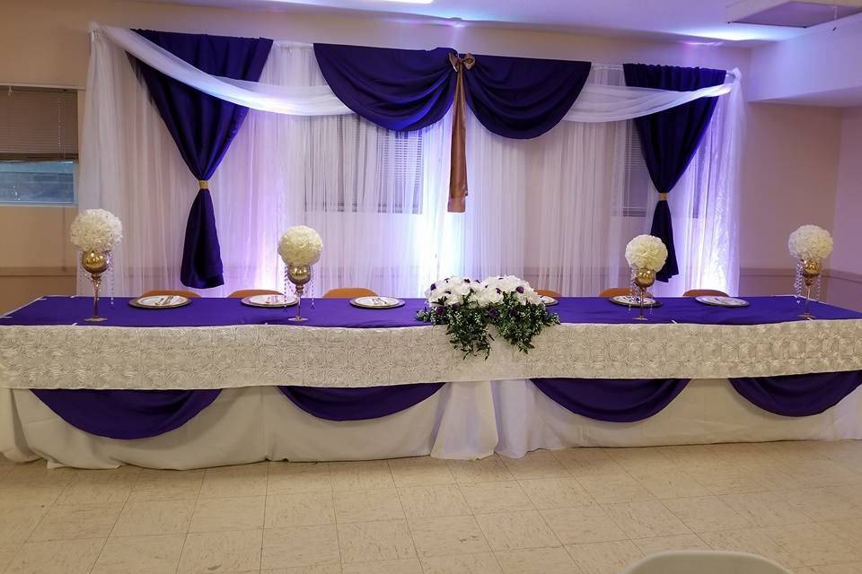 Violet head table decor