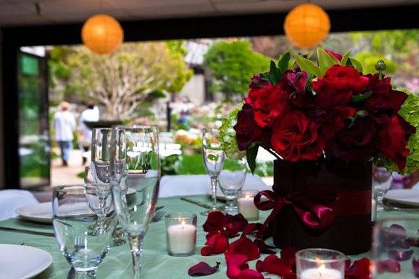 Reception in Garden Room. Flowers by Stem Floral Events. Photo Credit: Rengie Mendoza Photography. Both vendors can be found on WeddingWire.com.