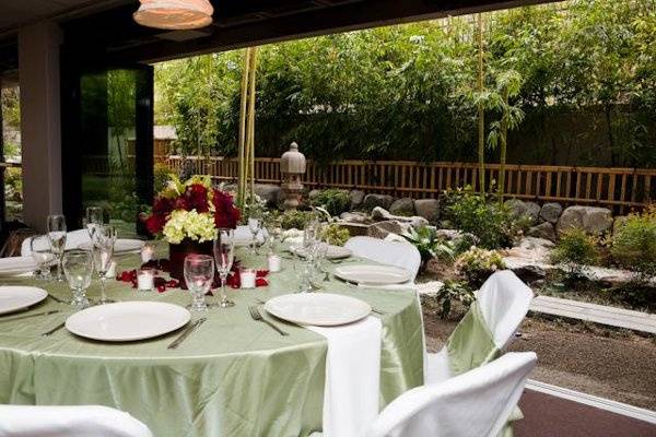 Reception in the Garden Room looking out to the Bamboo Garden. Flowers by Stem Floral Events. Photo Credit: Rengie Mendoza Photography. Both vendors can be found on WeddingWire.com.