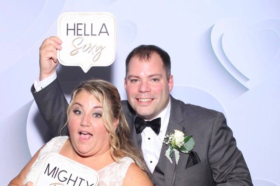 Bride and groom in photo booth
