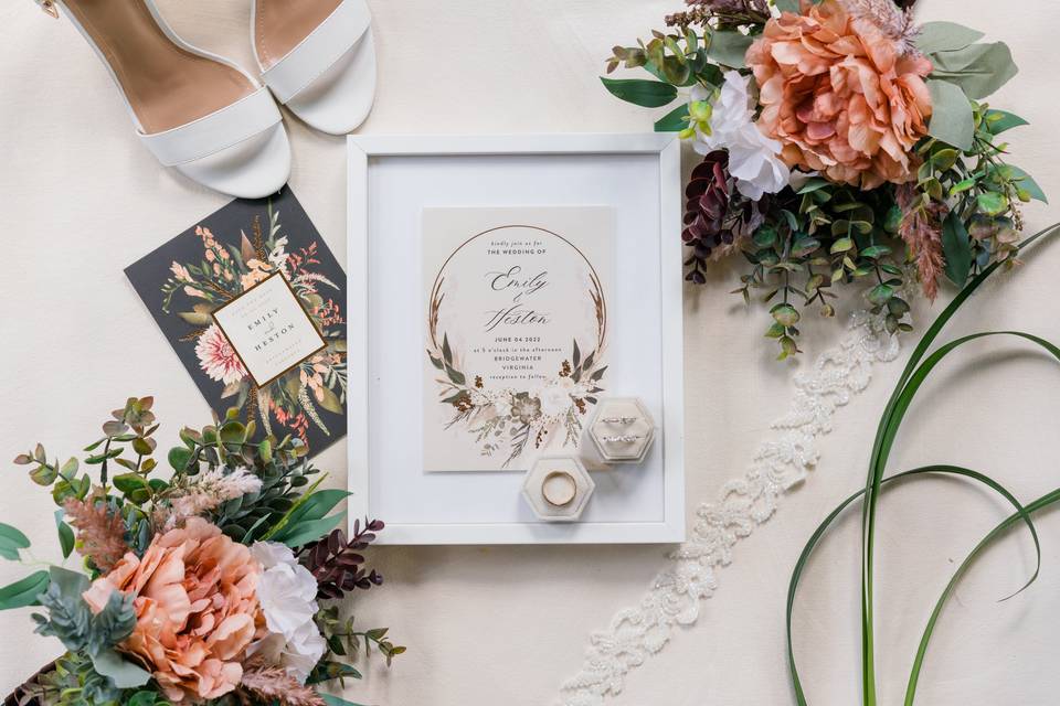 Framed invitation flat lay