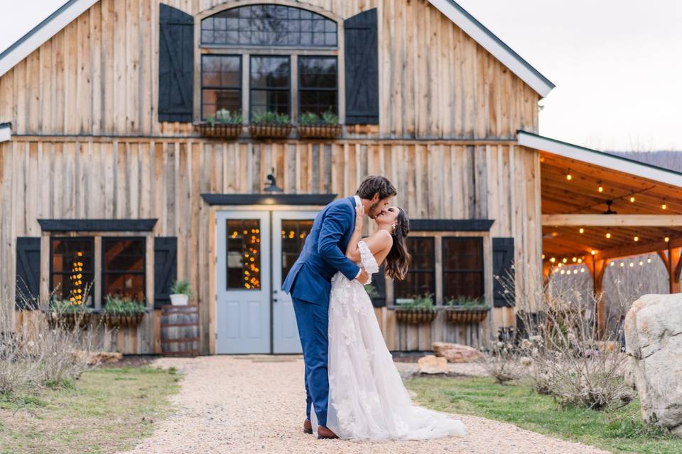 Wedding portrait outside barn