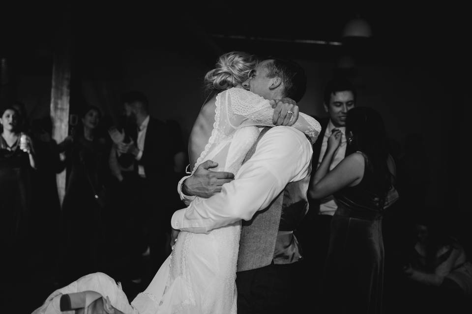 Houple hugging at reception