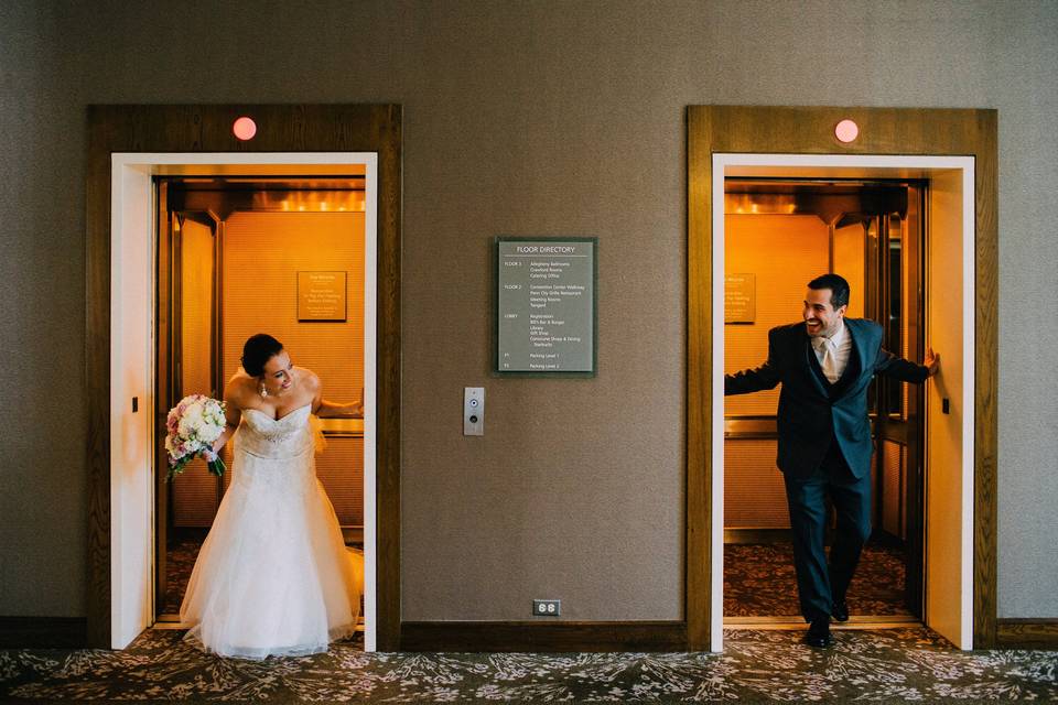 Newlyweds by the elevators