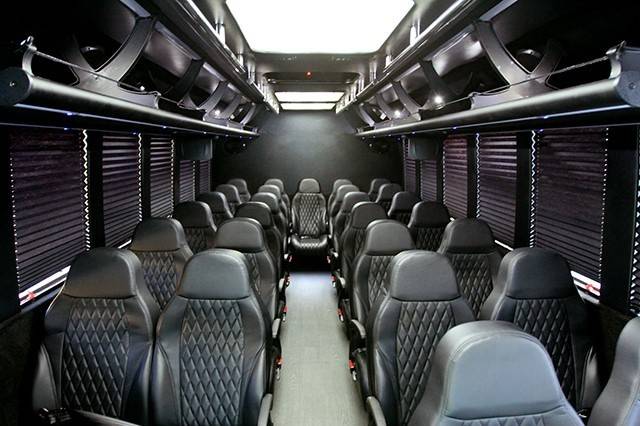 Inside of our 28 Passenger Executive Shuttle Bus. Contact us for any event!