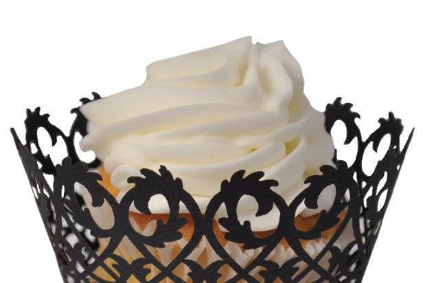 This fabulous set of 12 Black Filigree-design laser-cut cupcake wrapper are perfect for any special occasion.  Easy assembly and a unique look make these cupcake wrappers perfect for your special treats.  Create a beautiful cupcake tree, set at each place setting as a party favor, the possibilities are endless.
Wrappers are for presentation purposes only - not to bake in and measure 3-1/4