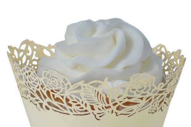 These fabulous ivory Rose Vine-design laser-cut cupcake wrappers are sold in a set of 12.  They easily assemble to slip your favorite cupcake or candy-filled cup into for a marvelous display. Create a beautiful cupcake tree, set at each place setting as a party favor, the possibilities are endless.  And with fast shipping and a low price guarantee, the cupcake wrappers are an even better addition to your special occasion!
Wrappers are for presentation purposes only - not to bake in and measure 3-1/4