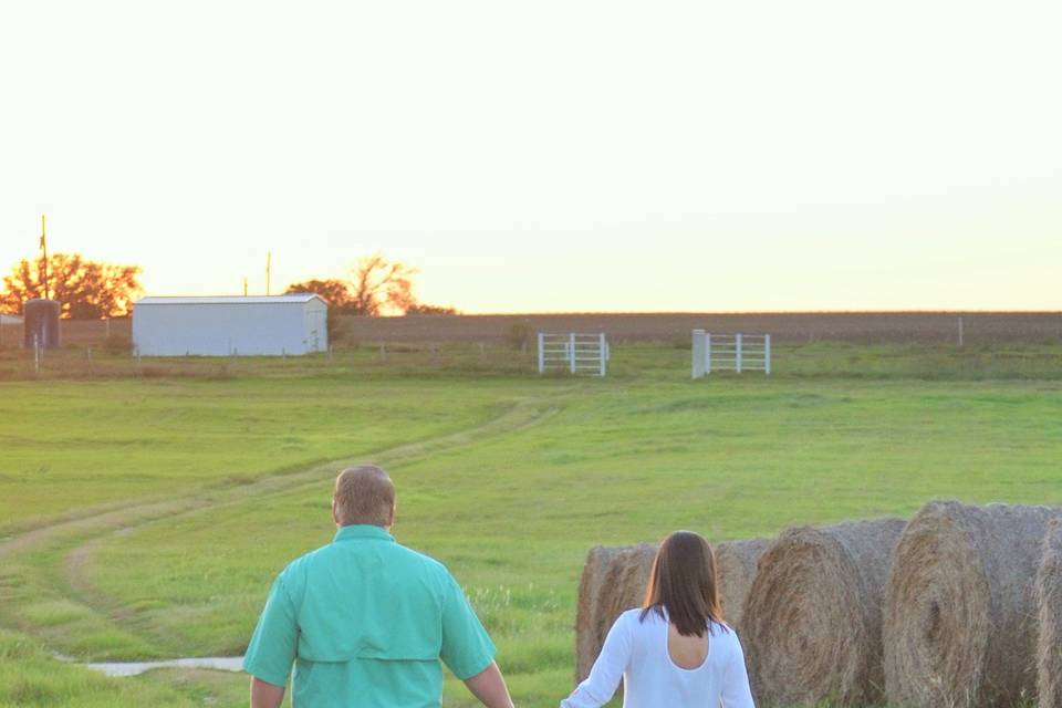 Couple leisurely walk hand in hand​