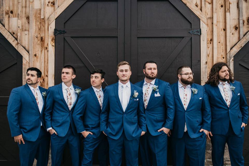 Men in front of barn