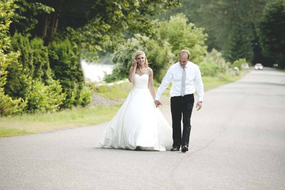 Bride and Groom walking on the street of Index Wa, River house wedding