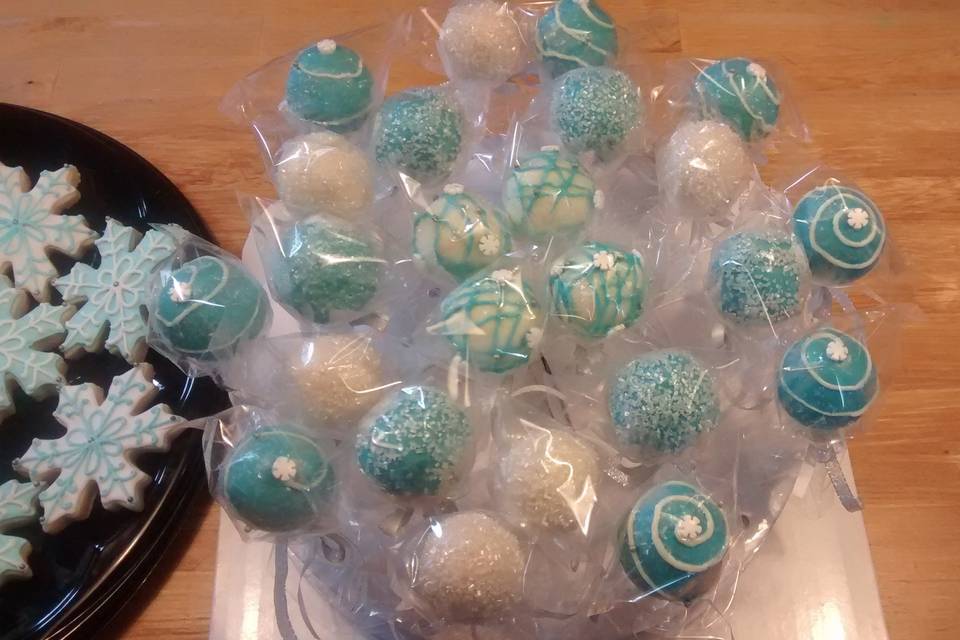 We also make delicious Cake Pops and Sugar Cookies to match any colors.