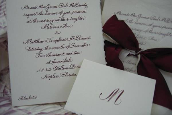 Custom Calligraphy reproduced for Invitation package we provided the paper & custom Monogram used. Created a stamp out of monogram for use during wedding weekend.