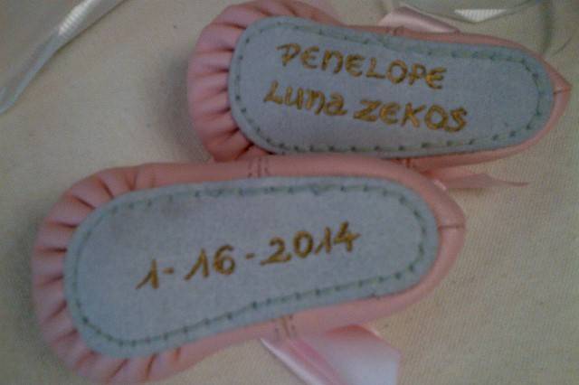 Baby Booties for Baby's first photoshoot, feet up. #CBE #Baby #CalligraphyGift #Personalized