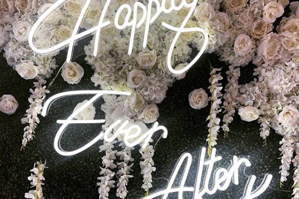 Happily Ever After in white neon