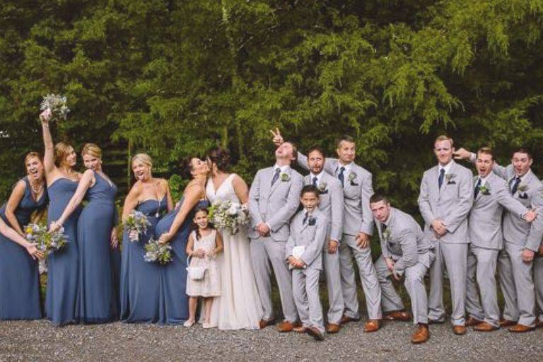 The couple with the bridesmaids and groomsmen