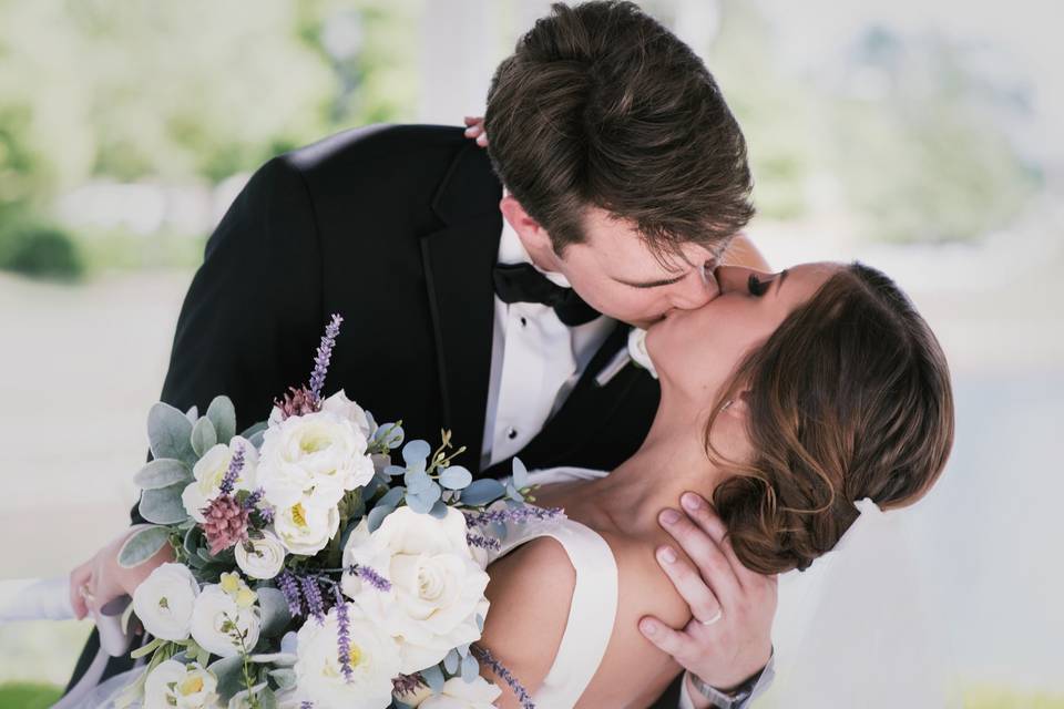 Bride and groom kissing