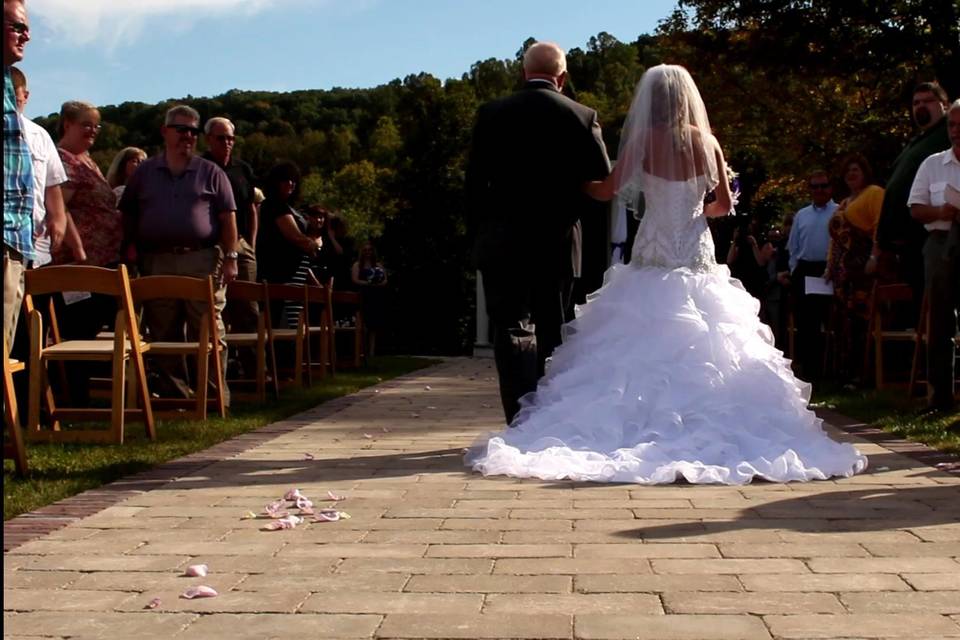 Sarah was escorted down the isle by her father.  Look at that dress!!