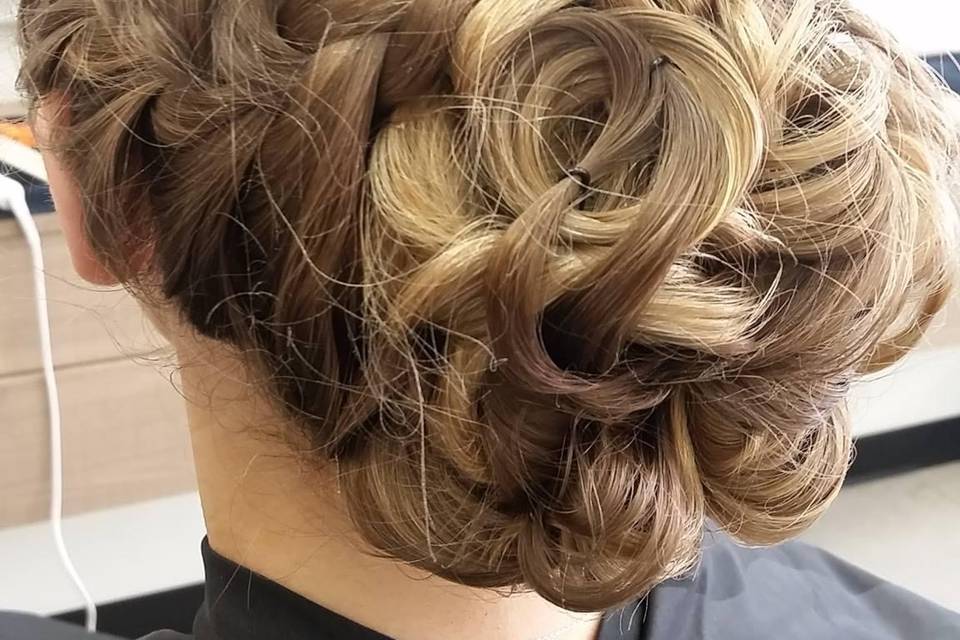 Sophisticated updo with braided detailing