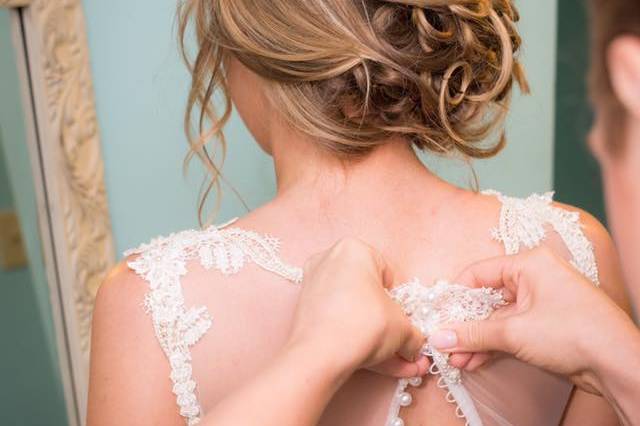 Curled side updo for the bride