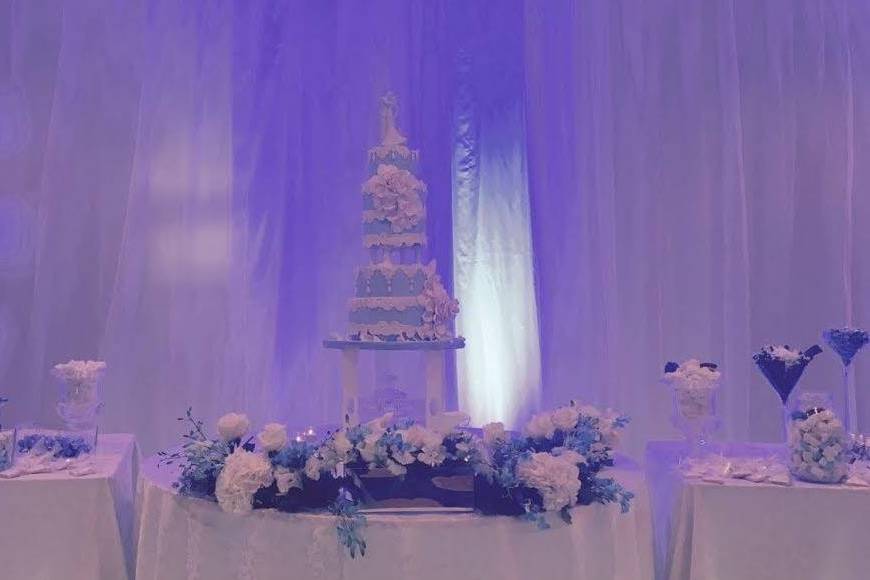 Blue wedding cake on table