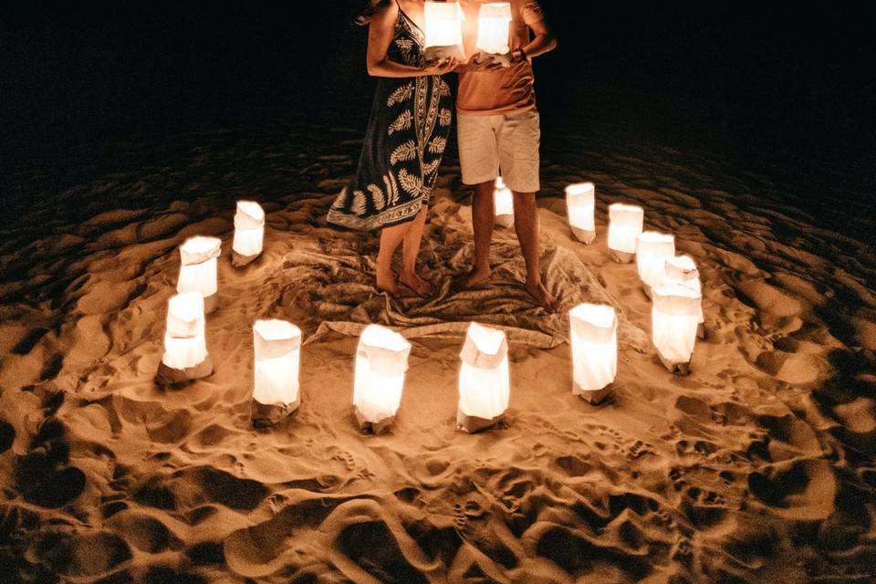 Candlelit beach couple