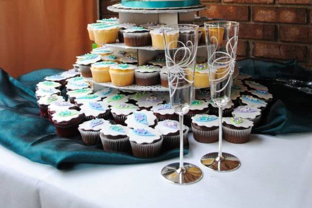 Wedding cake and cupcakes