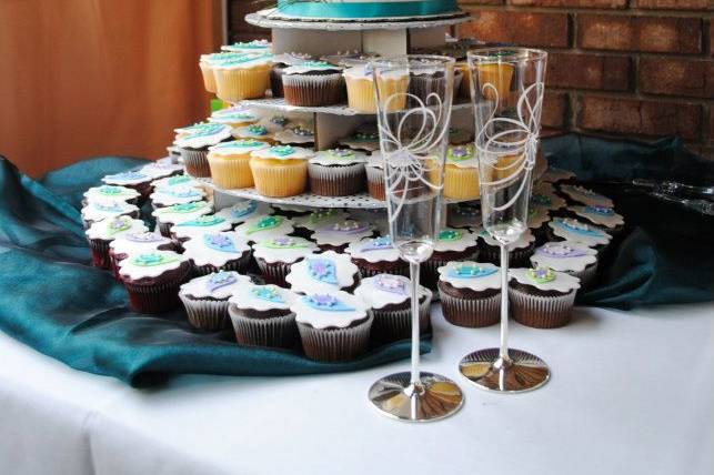 Wedding cake and cupcakes