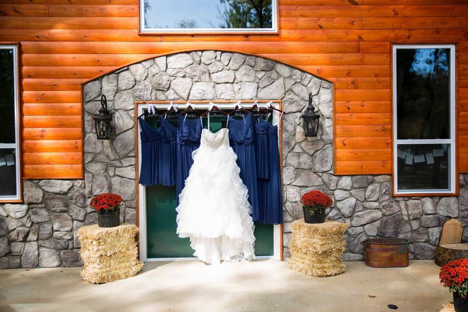 The rock accents around the door and perimeter add a rustic yet elegant contrast. We can decorate the entryway to fit your vision! Photo by Melissa Albey Photography