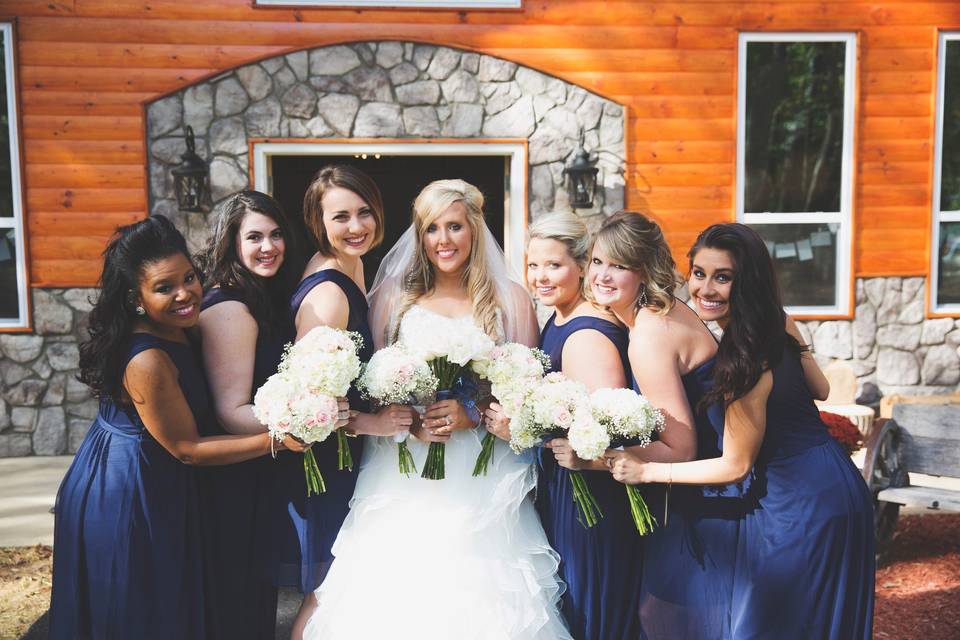The venue is the perfect backdrop for your group pictures! Photo by Melissa Albey Photography
