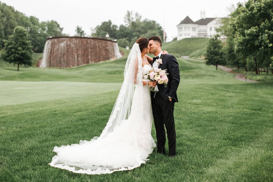 Newlyweds kissing