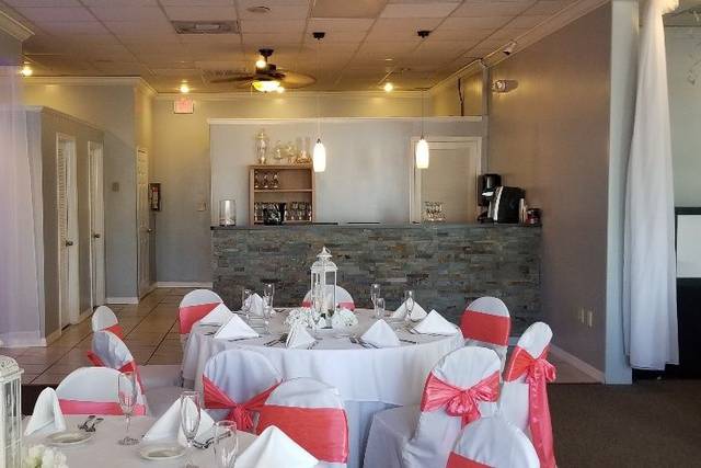 White table setup with a touch of pink