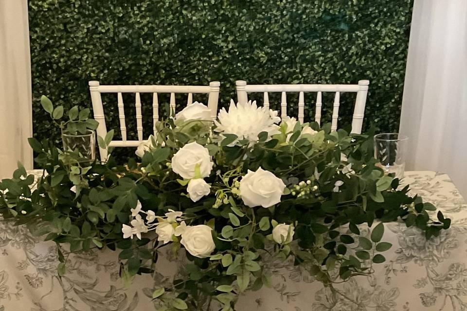 Sweetheart table faux flowers