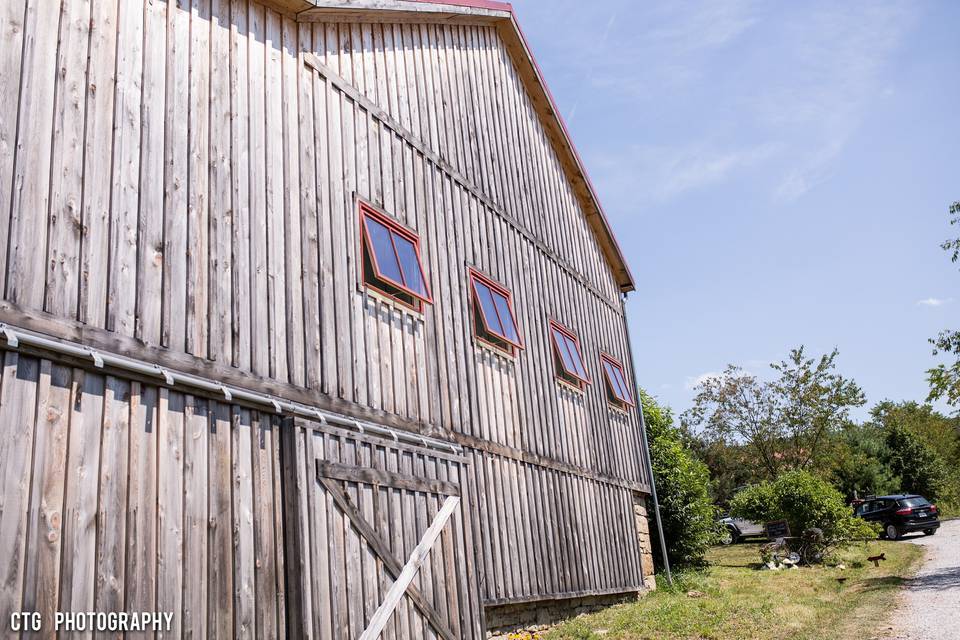 Right Side of Historic Barn next to large parking area for guests