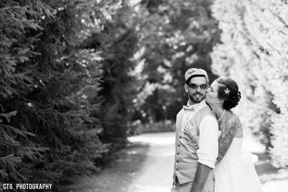 First Kiss of Bride and Groom at Pine Trees