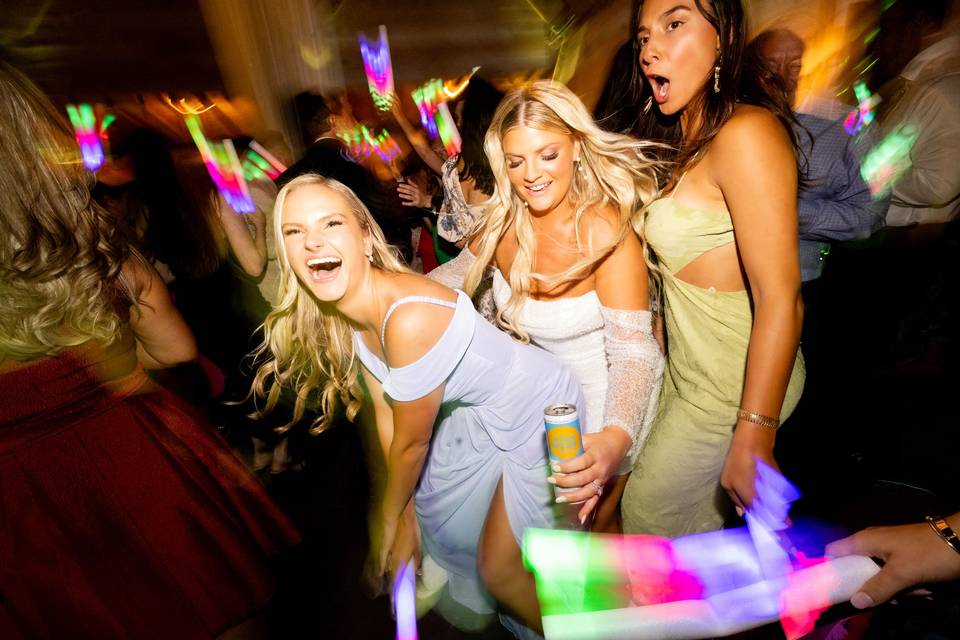 Dancing under chandelier