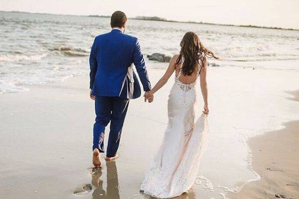 Couple walking along the beach