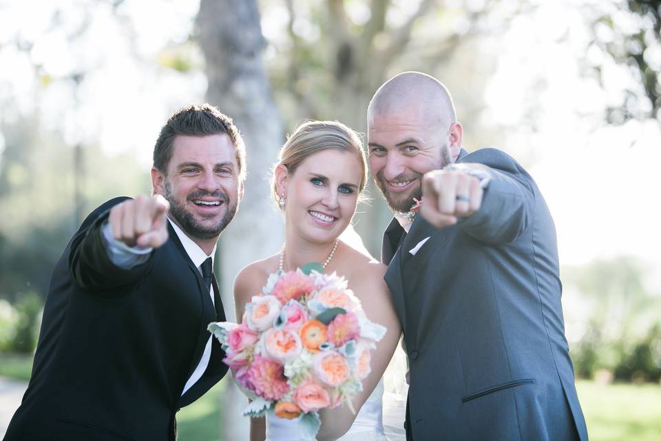 The newlyweds and the officiant