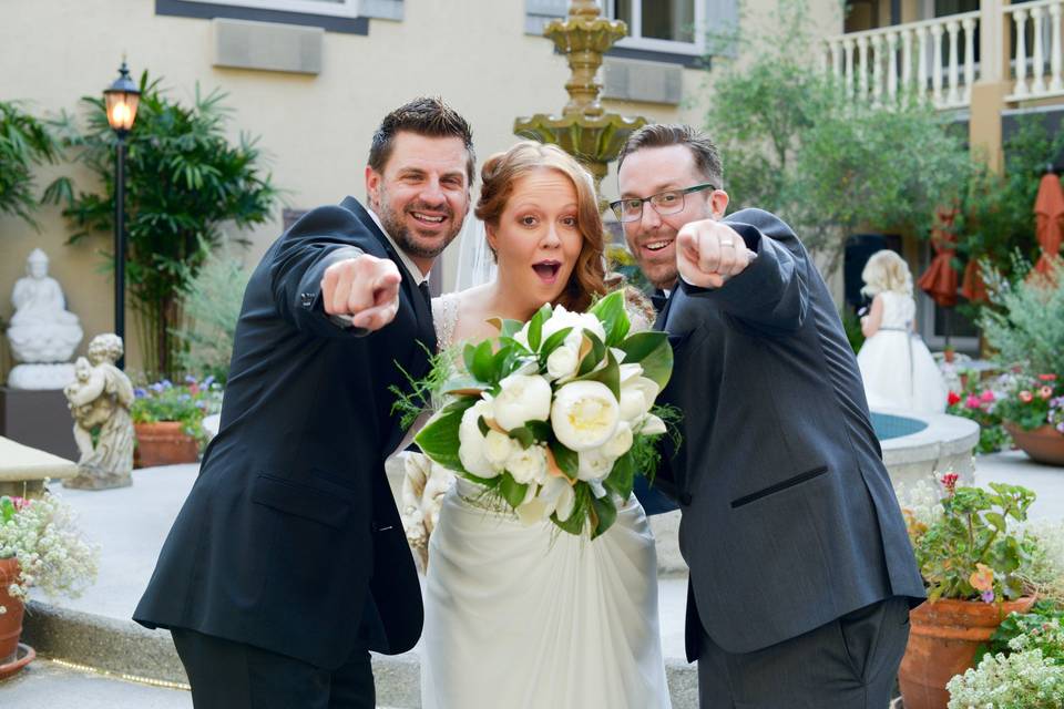 The newlyweds with the officiant