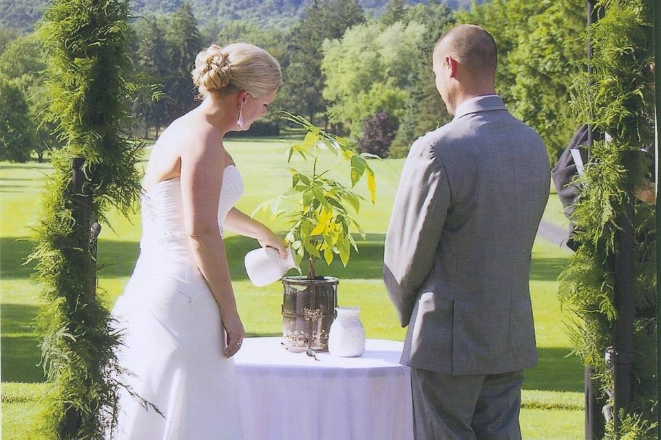 Bride hugging the officiant