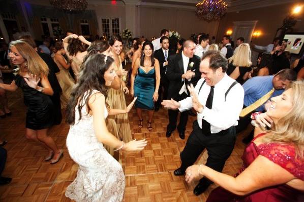 Couple dancing with the guests