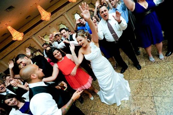 Couple dancing with the guests