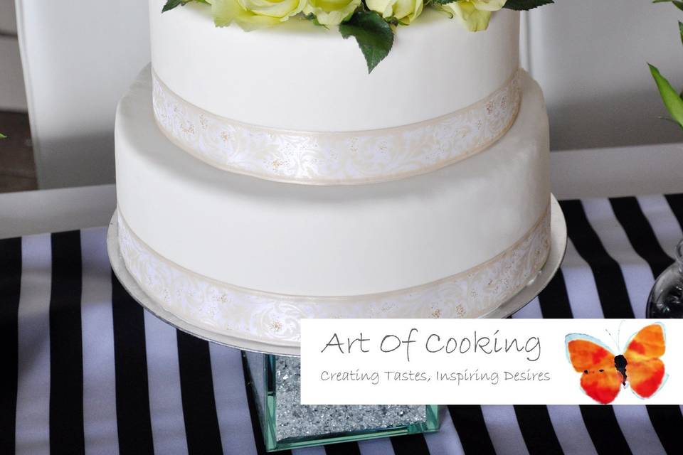 Elegant White wedding cakes and Green roses by Art Of Cooking new Wedding cake and Dessert food station collection.For more information go to :http://www.aoclasvegas.com