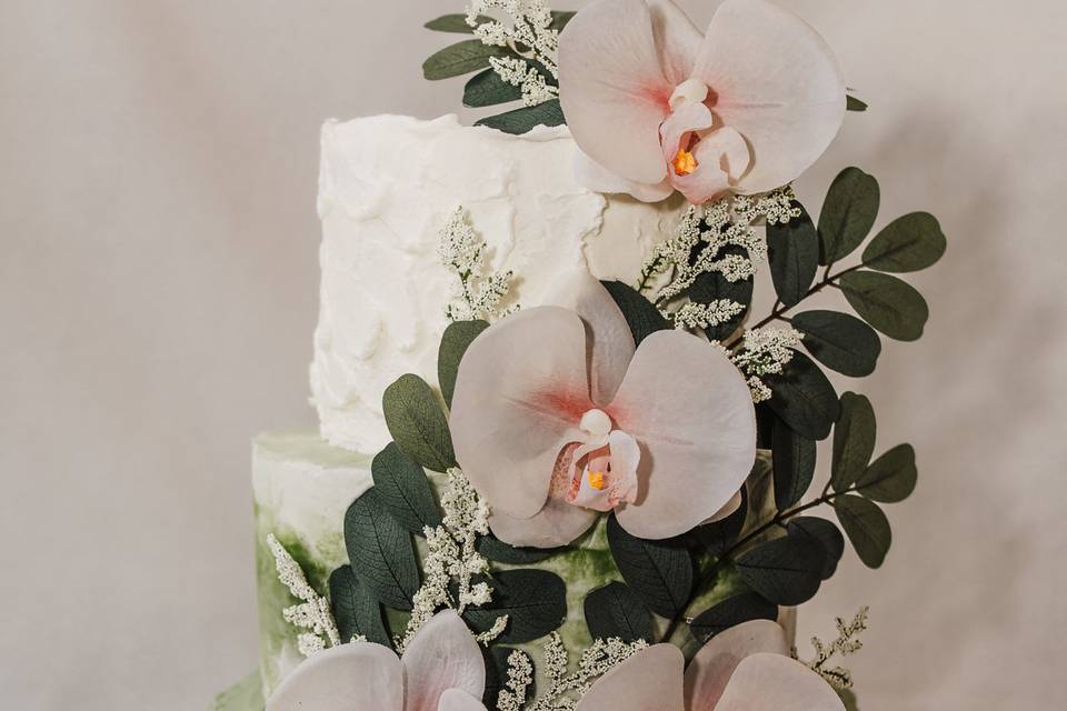 Sage tiered with orchids