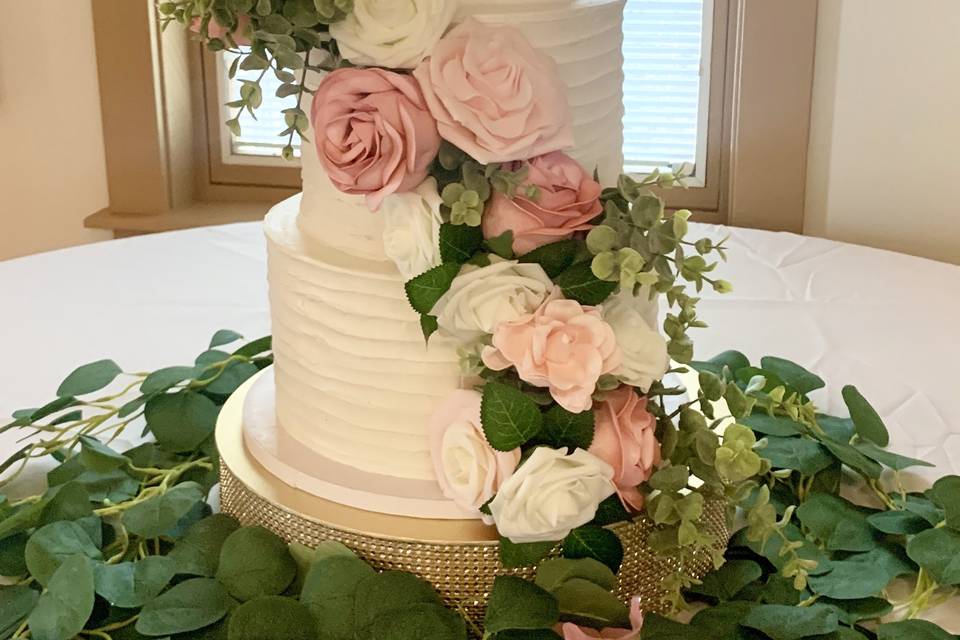 3 tier cake with roses