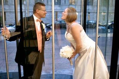 Bride and Groom making the best of a rainy day. Taken at the UMASS Club, Boston, MA.