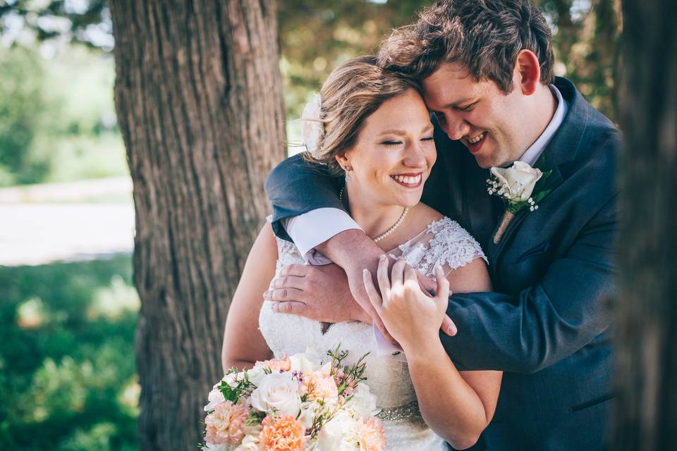 Bride and groom embracing (Braden and Lindsey)