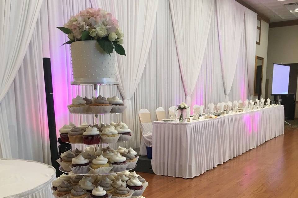 Wedding cake and cupcakes