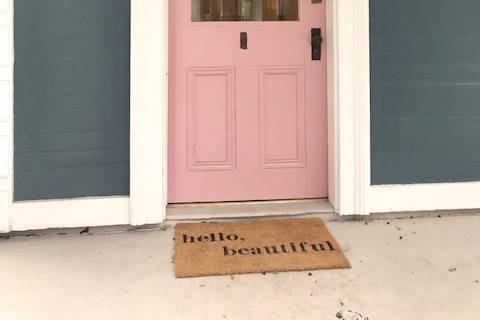 A pink door to welcome you