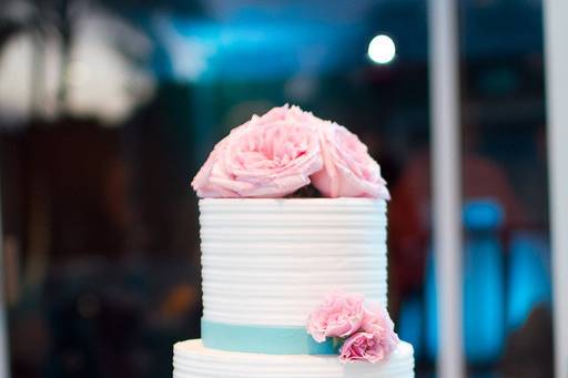 Wedding cake with blue and pink accents